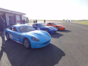 3 track cars from left to right